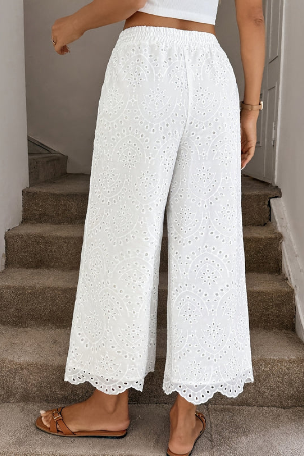 Trendy women's bohemian cropped pants. Comfortable relaxed fit, excellent for summer fashion, vacations, and beach outfits.