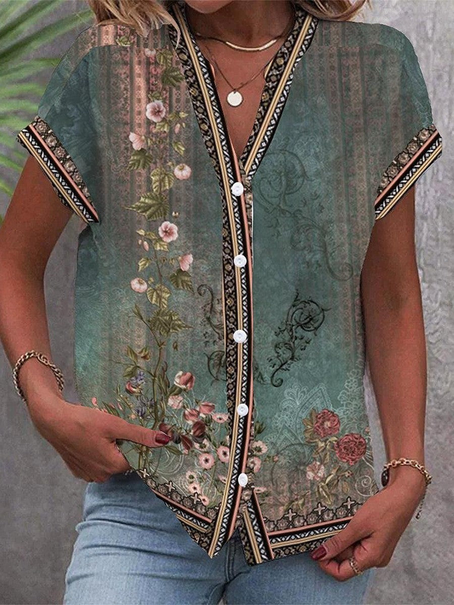 Women's bohemian floral V-neck short sleeve blouse. Chic casual summer top with a relaxed fit.