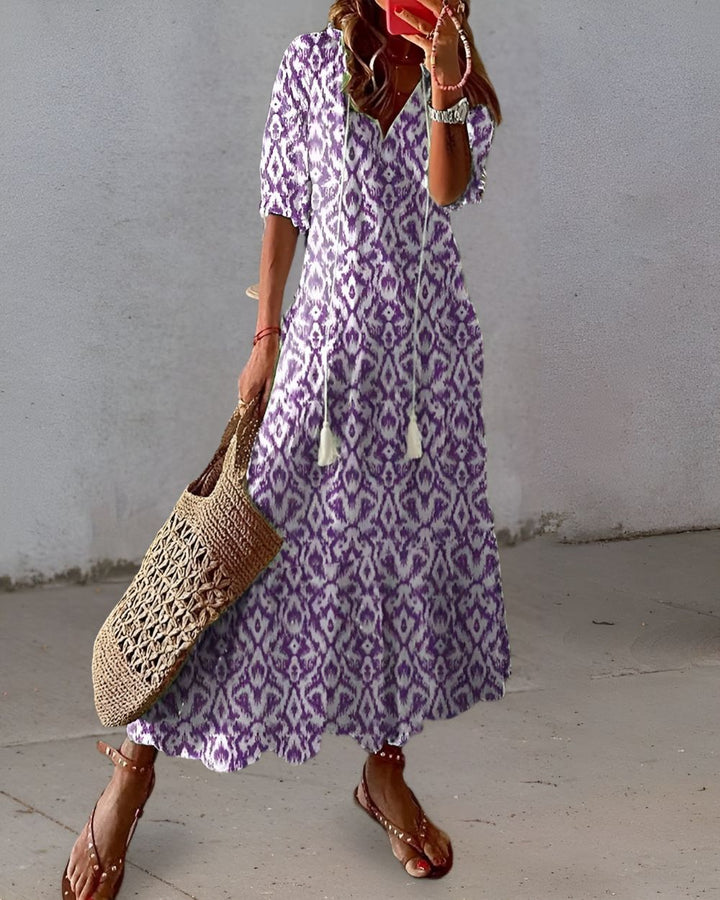 Relaxed fit women's midi dress in boho style, great for comfortable summer and beach outings.