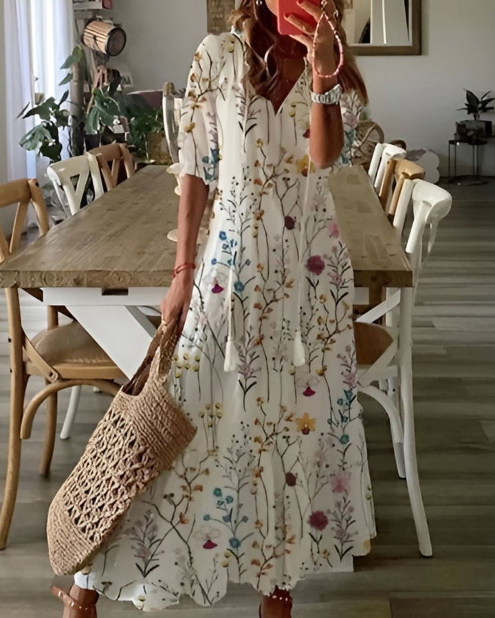 Versatile women's boho midi dress, flowing with adjustable straps, suitable for summer or vacation.