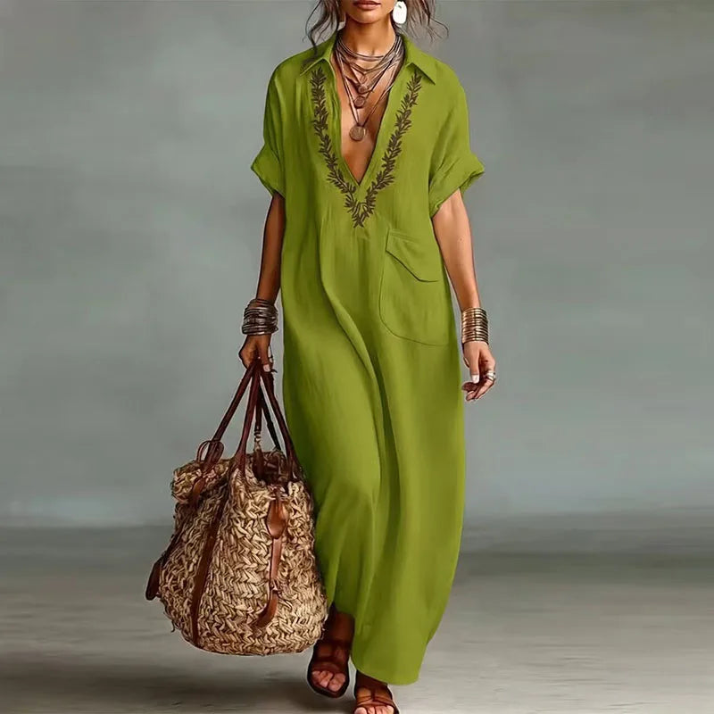 Stylish women's bohemian print maxi dress with deep V-neck. Comfortable flowing summer vacation outfit.