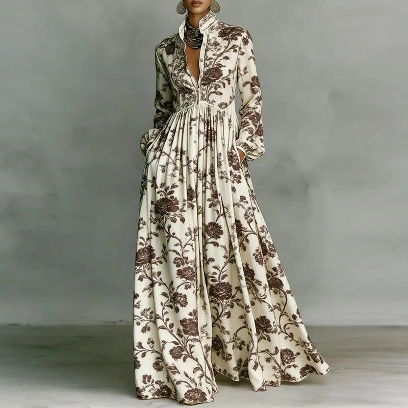 Flowy Bohemian maxi dress for women featuring a vibrant print, long sleeves, and a comfortable, elegant style.