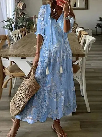 Chic women's summer boho midi dress, flattering A-line cut with lantern sleeves and eye-catching geometric print.