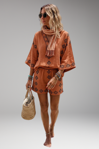 Relaxed fit women's boho two-piece set with an embroidered V-neck top and comfy shorts.
