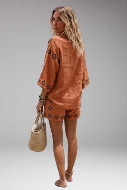 Chic women's boho embroidered V-neck top & shorts set. A fashionable two-piece for summer and resort.
