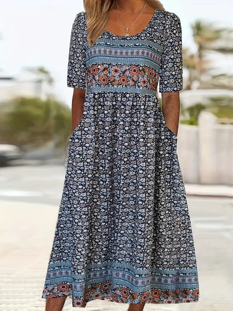 Flowy bohemian print midi dress for women, featuring a relaxed fit, round neck, and short sleeves.