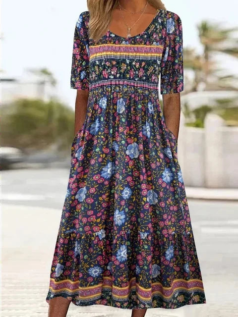 Women's short-sleeve midi dress with a unique boho print, round neck, and essential side pockets.