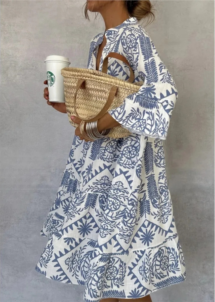Comfortable oversized boho printed midi dress for women, with a vibrant pattern and relaxed fit.