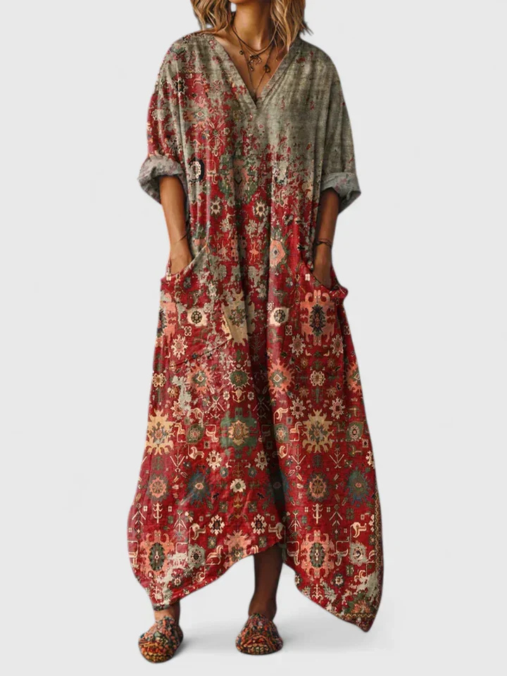 Flowy bohemian maxi dress for women, featuring a vibrant print, comfy fabric, and practical front pockets.