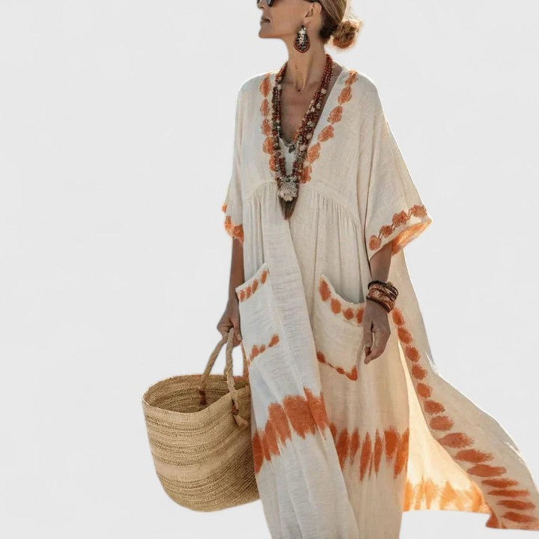 Casual women's striped maxi dress with V-neck, ideal beach kaftan for vacation & summer fashion.