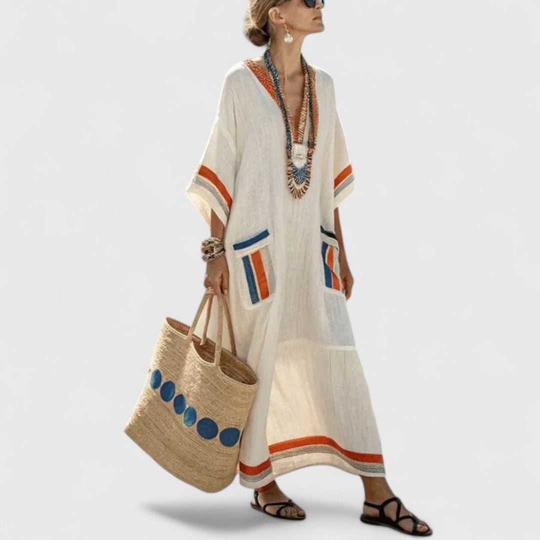 Striped boho V-neck maxi dress, loose fit, a women's summer kaftan ideal for warm weather vacations.