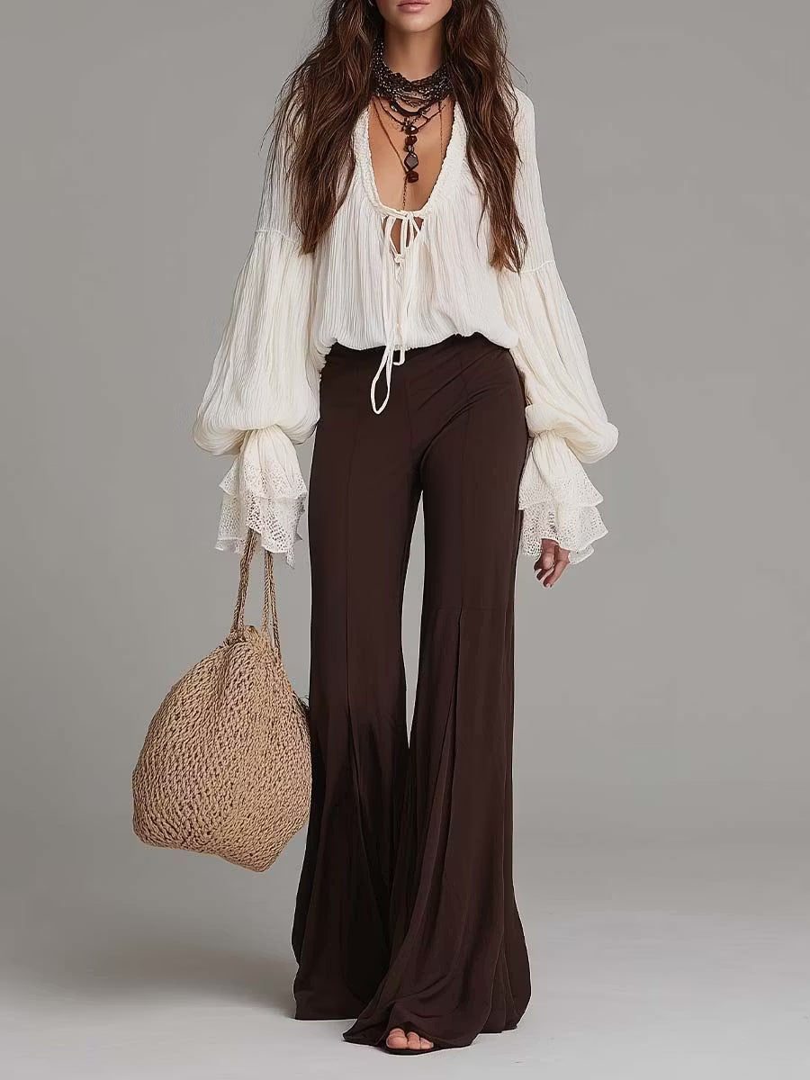 Women's boho two-piece set: lace-up crop top & wide-leg flare pants for a chic summer festival outfit.