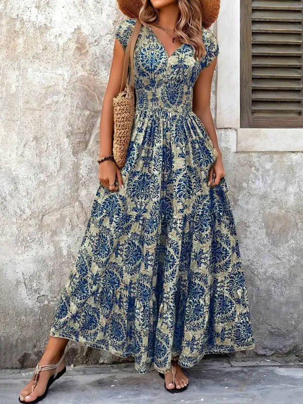Effortless women's boho midi dress with a flattering V-neck. Ideal for elegant summer occasions.