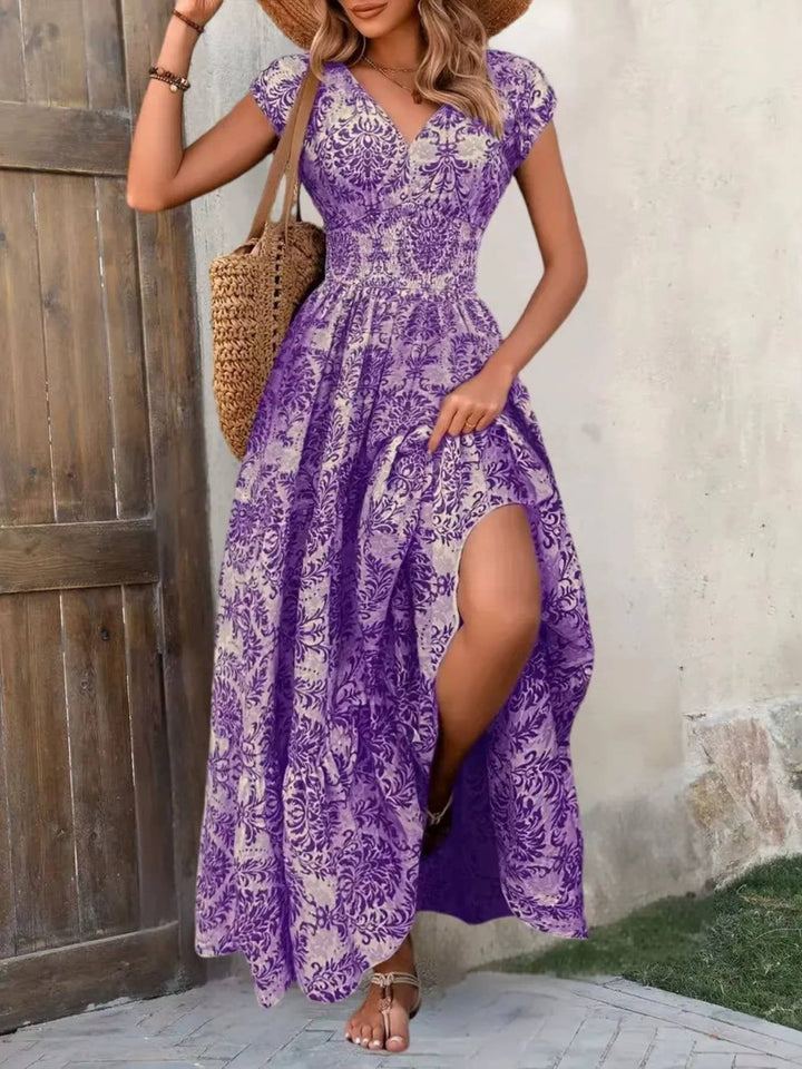 Stylish women's V-neck midi dress, featuring a boho aesthetic for versatile summer wear.
