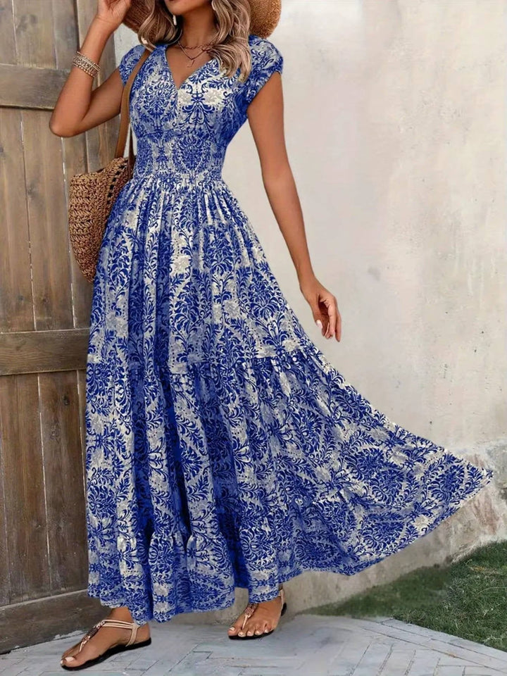 Elegant women's boho midi dress, a chic V-neck design for effortless summer and occasion styling.