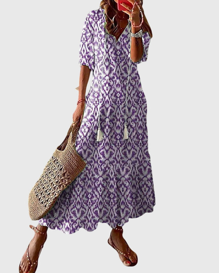 Flowy V-neck boho maxi dress for women, vintage summer style, great beachwear & vacation outfit.