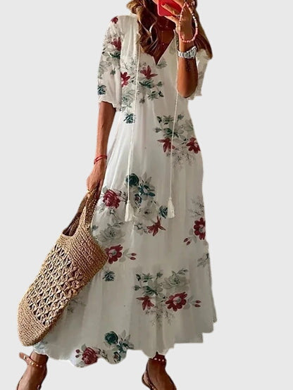 Women's long boho summer dress, vintage v-neck style, comfortable flowy fabric for casual elegance.