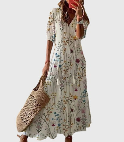 Elegant women's vintage boho maxi dress, v-neck, flowy silhouette, perfect for summer beach parties.