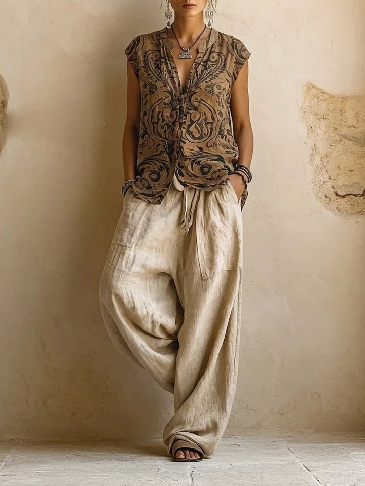 Flowy wide leg pants and matching top with a relaxed fit boho print cardigan, a versatile women's summer set.