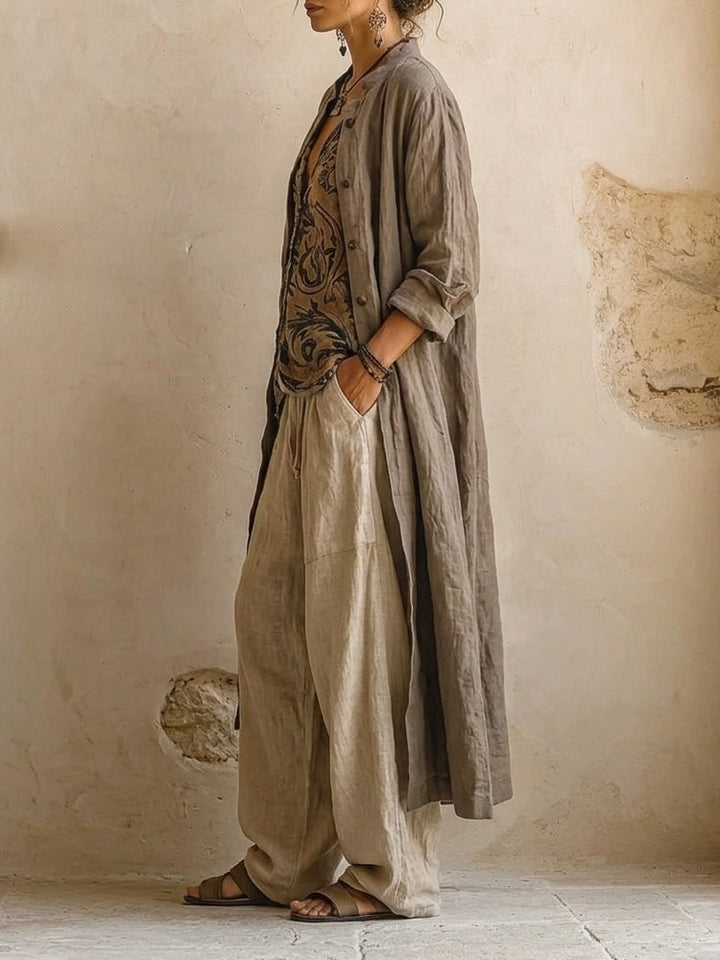 Chic women's wide leg pants set featuring a vibrant ethnic print boho cardigan, perfect for relaxed summer style.