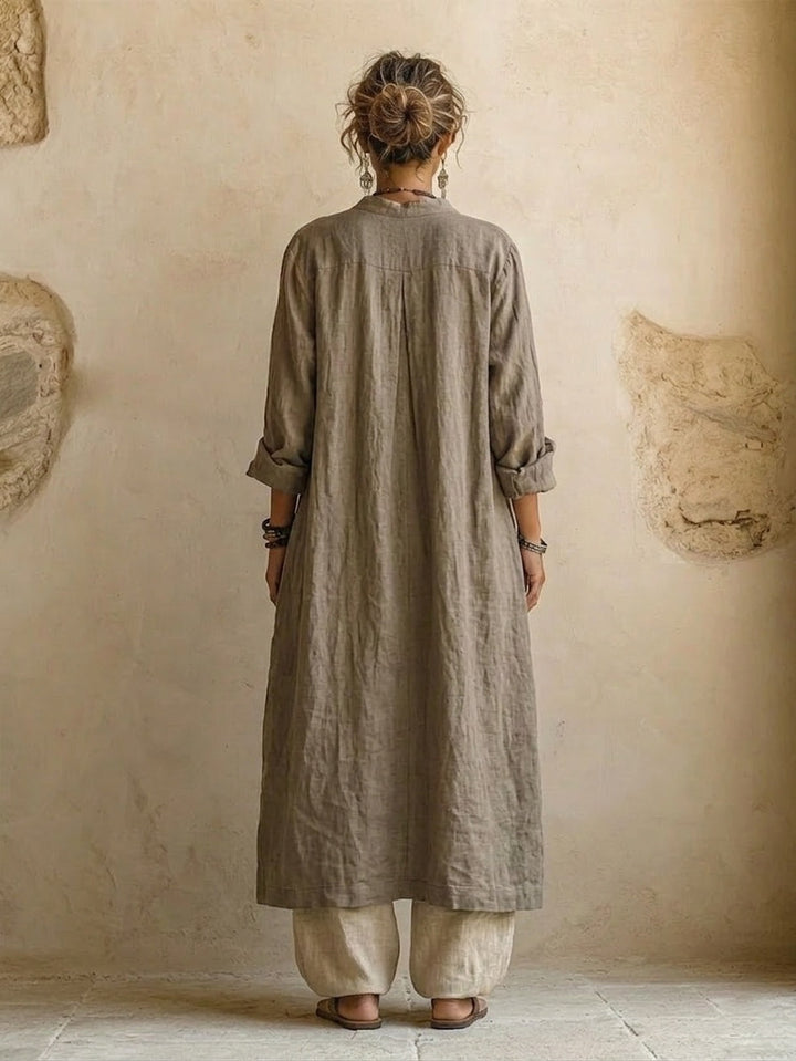 Comfortable women's casual wear: flowy wide leg pants, top, & stylish ethnic print boho cardigan, a relaxed fit set.