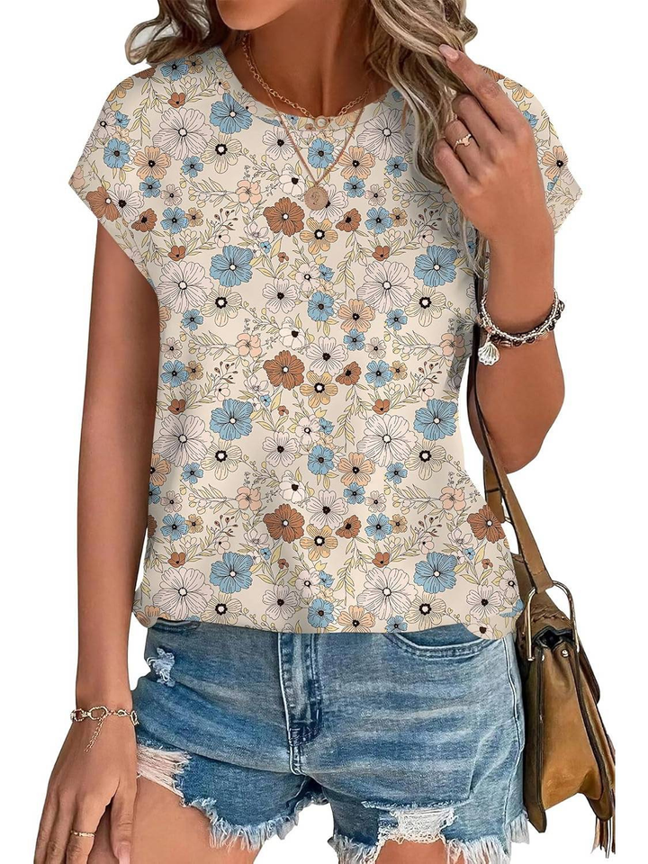 Elegant women's botanical leaf print cap sleeve top. A comfortable and versatile summer essential.
