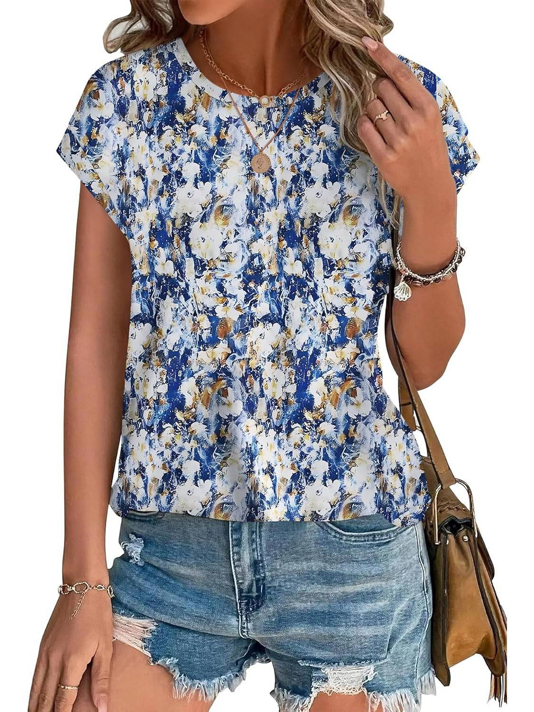Soft women's botanical leaf print cap sleeve blouse, perfect for versatile summer outfits.