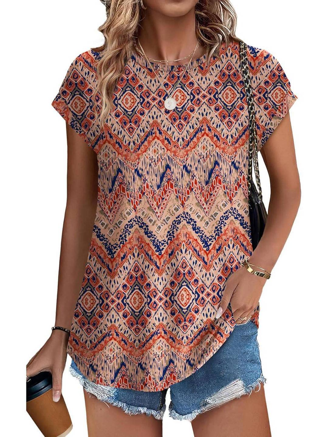 Versatile women's cap sleeve top with a beautiful leaf print, great for summer or casual outings.
