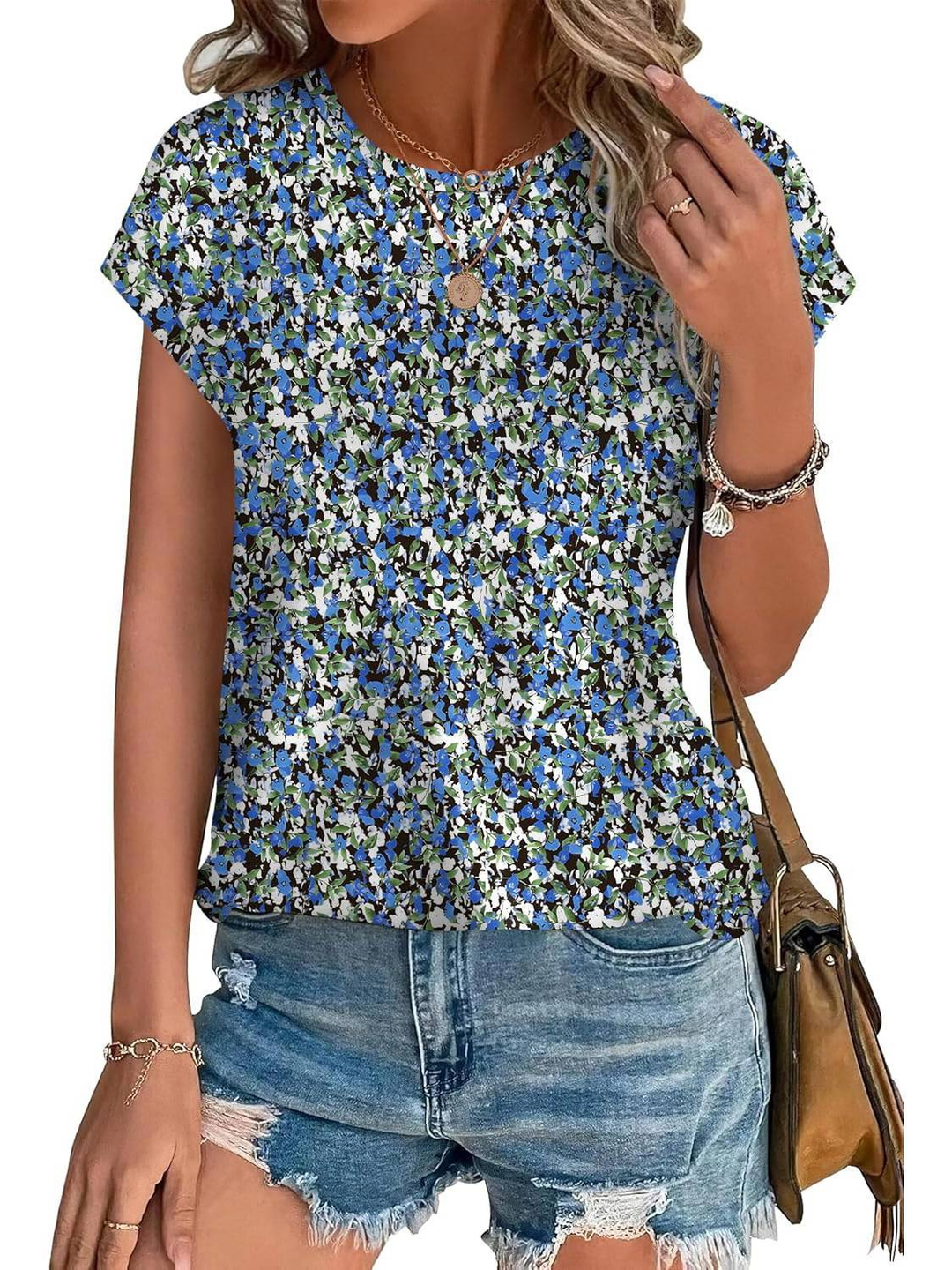 Women's botanical leaf print cap sleeve top. Soft and breathable for comfortable daily wear.