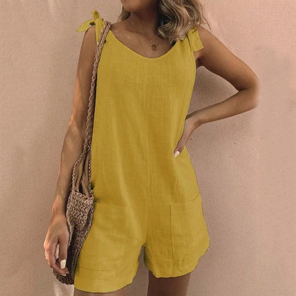 Casual women's playsuit featuring cute bow straps and side pockets, great for everyday or vacation outfits.