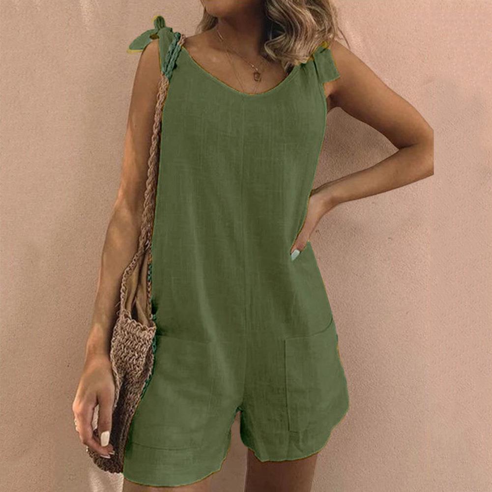 Chic women's playsuit with bow straps and pockets, a versatile romper for stylish warm weather looks.