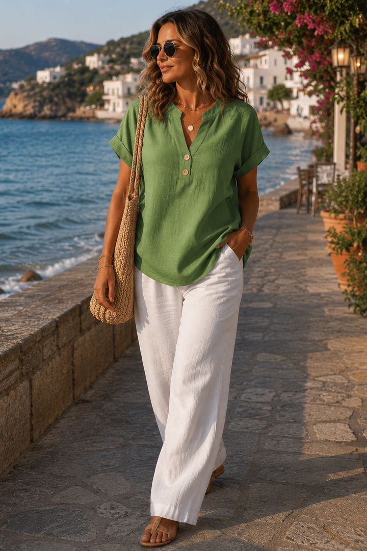 Versatile women's button-up top, perfect for casual or office wear.