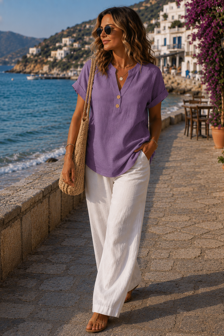 Stylish women's button-up top with long sleeves, offering comfortable chic.