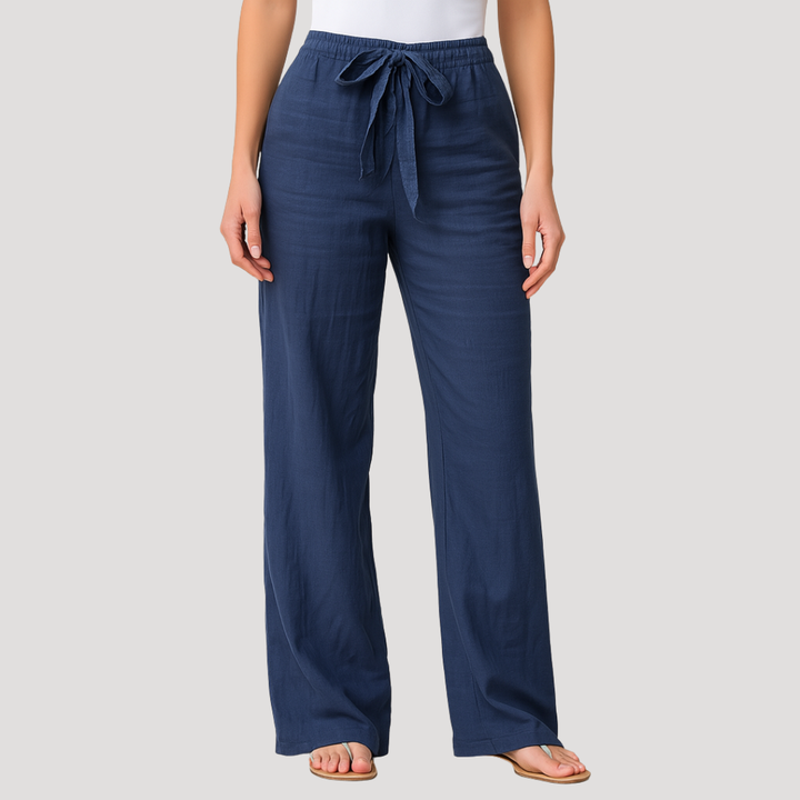 Women's breathable linen straight leg trousers with drawstring waist. Ideal for casual summer wear.