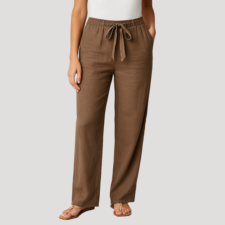 Relaxed fit women's linen drawstring trousers in a straight leg style. Breathable casual pants for summer.