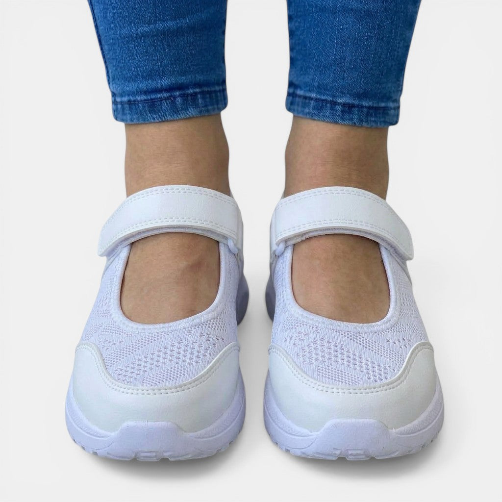 Stylish blue women's comfort shoes, slip-on sneakers with breathable mesh & ergonomic foot support.
