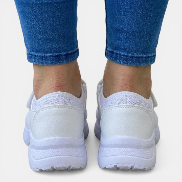 Women's casual walking shoes: breathable slip-on sneakers with orthopedic design for all-day foot support.