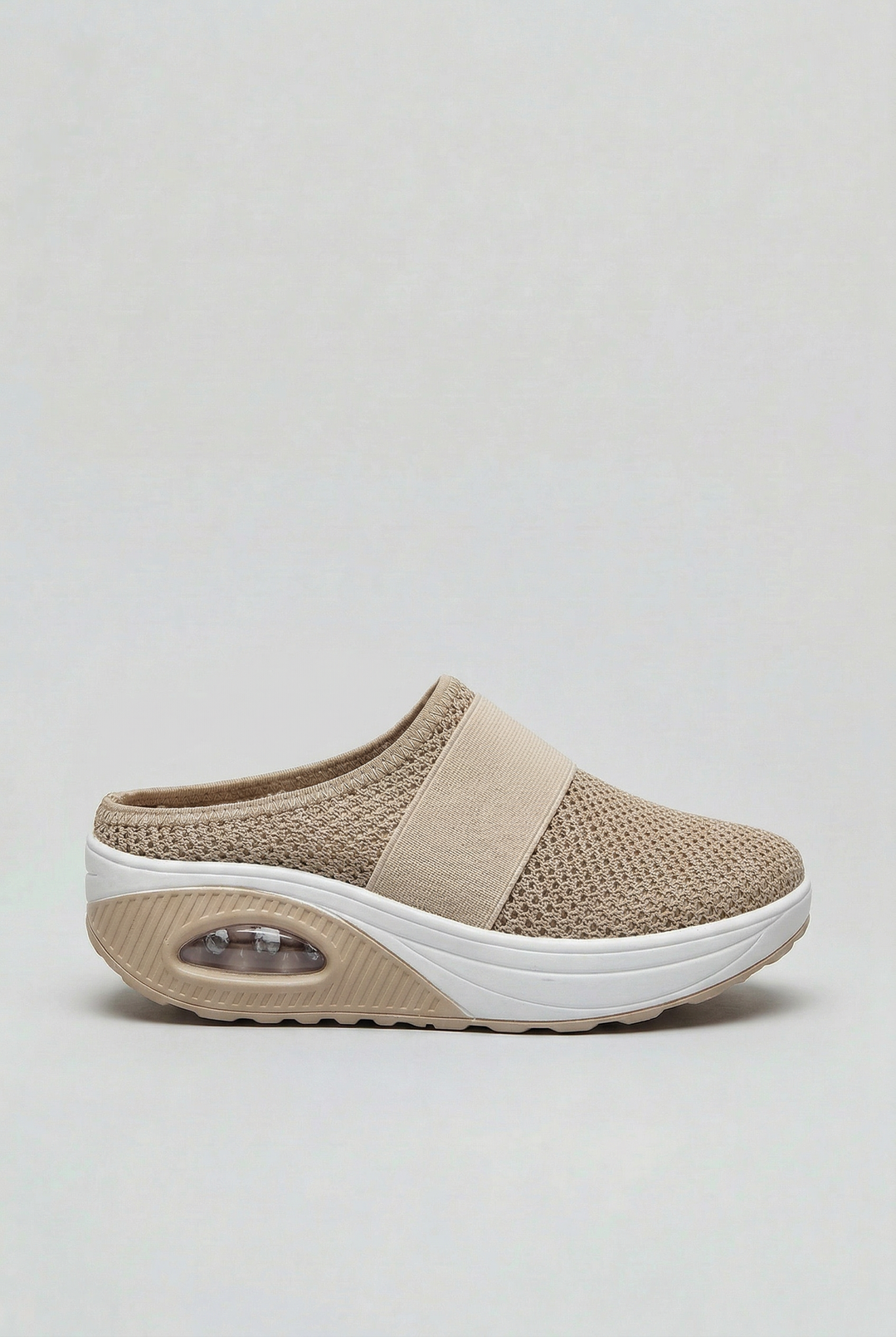 Women's breathable slip-on mules with air cushion sole for ultimate comfort.