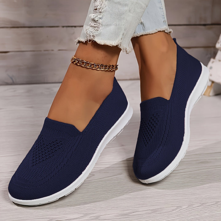 Lightweight women's slip-on shoes with breathable mesh for all-day comfort. Ideal for walking & travel.
