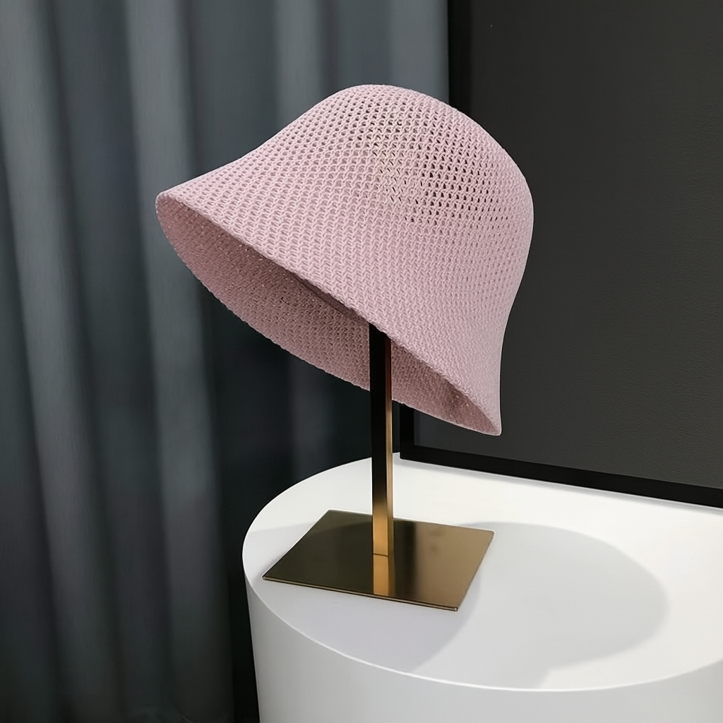 Stylish women's breathable bucket hat, perfect for summer. Foldable for easy travel, offering excellent UV sun protection.