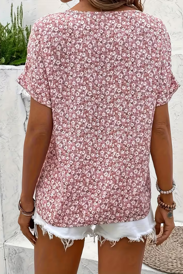 Vibrant floral print women's blouse, a versatile breezy shirt for summer, casual, or vacation wear.