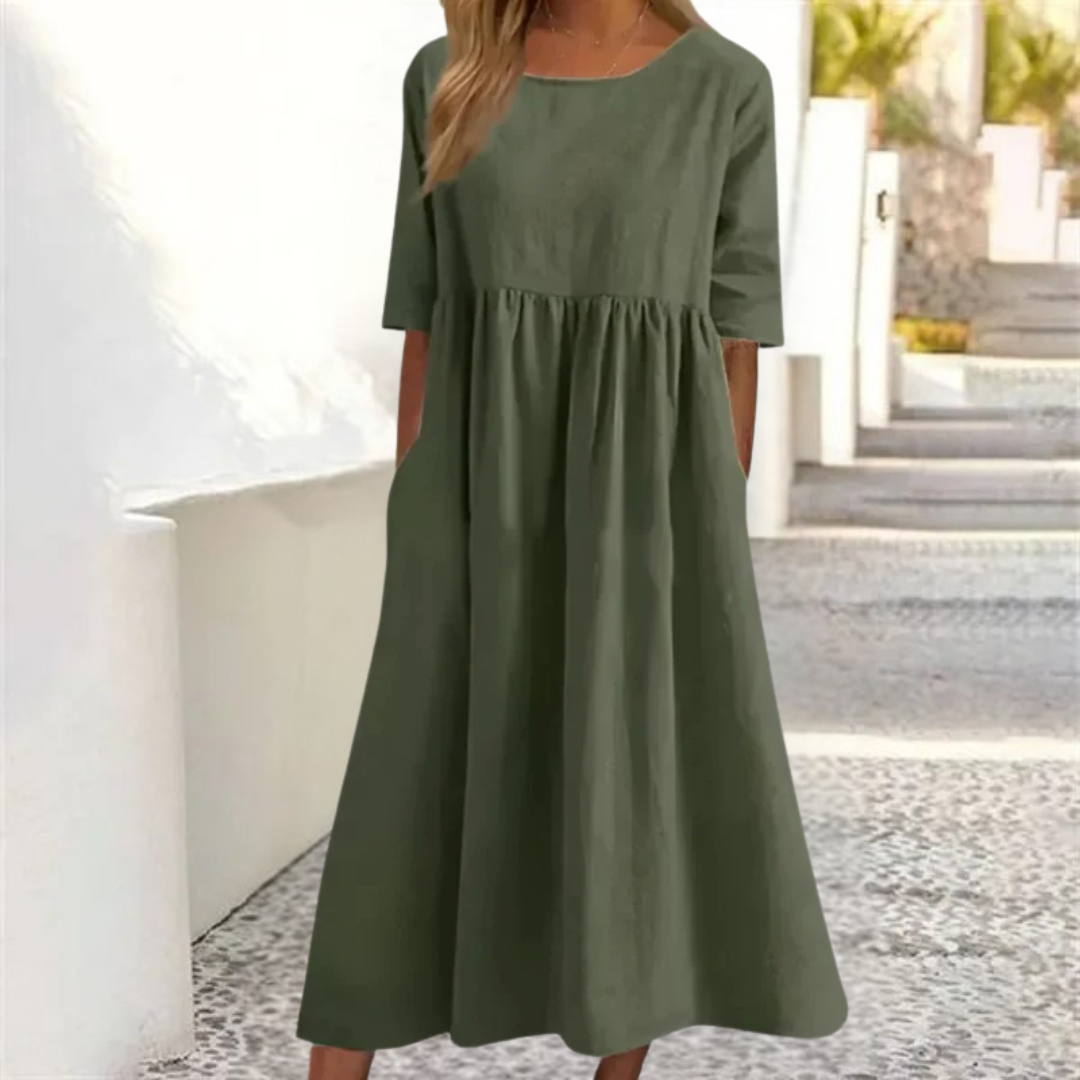 Comfortable women's breezy summer midi dress, smocked waist, short sleeves, great for everyday style.