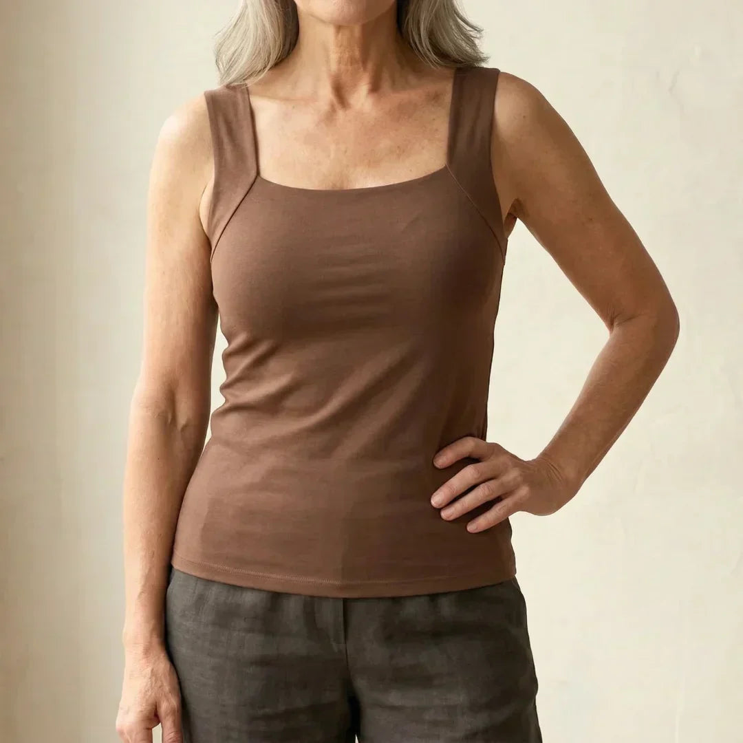 Women's built-in bra tank top in black for effortless support & everyday comfort.