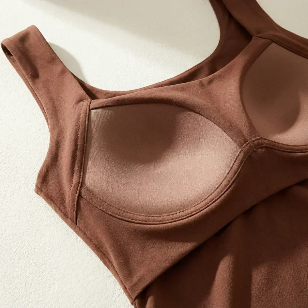 Seamless women's built-in bra tank, providing gentle support for all-day comfort.