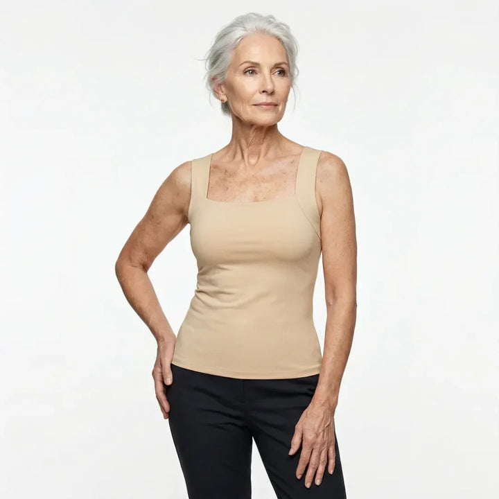 Chic women's casual tank top featuring a built-in bra for effortless style & support.