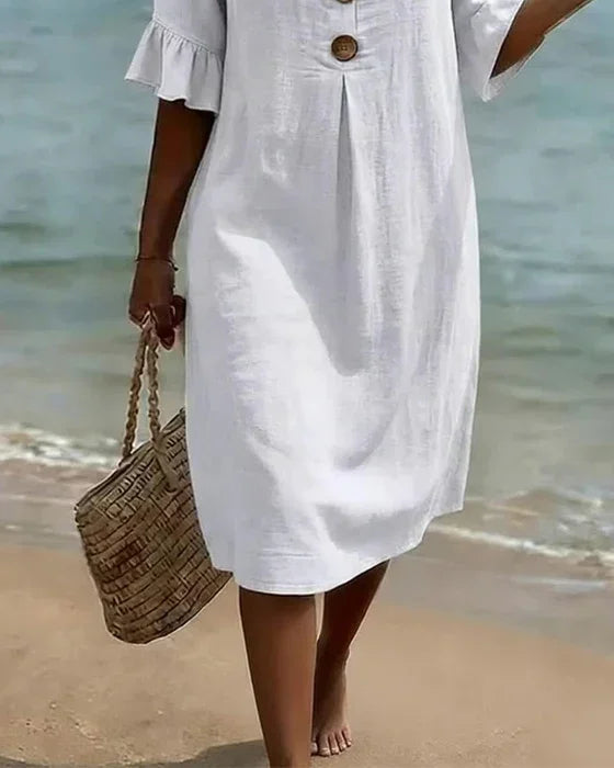 Comfortable relaxed fit women's midi dress with button-front and ruffle sleeves for everyday wear.