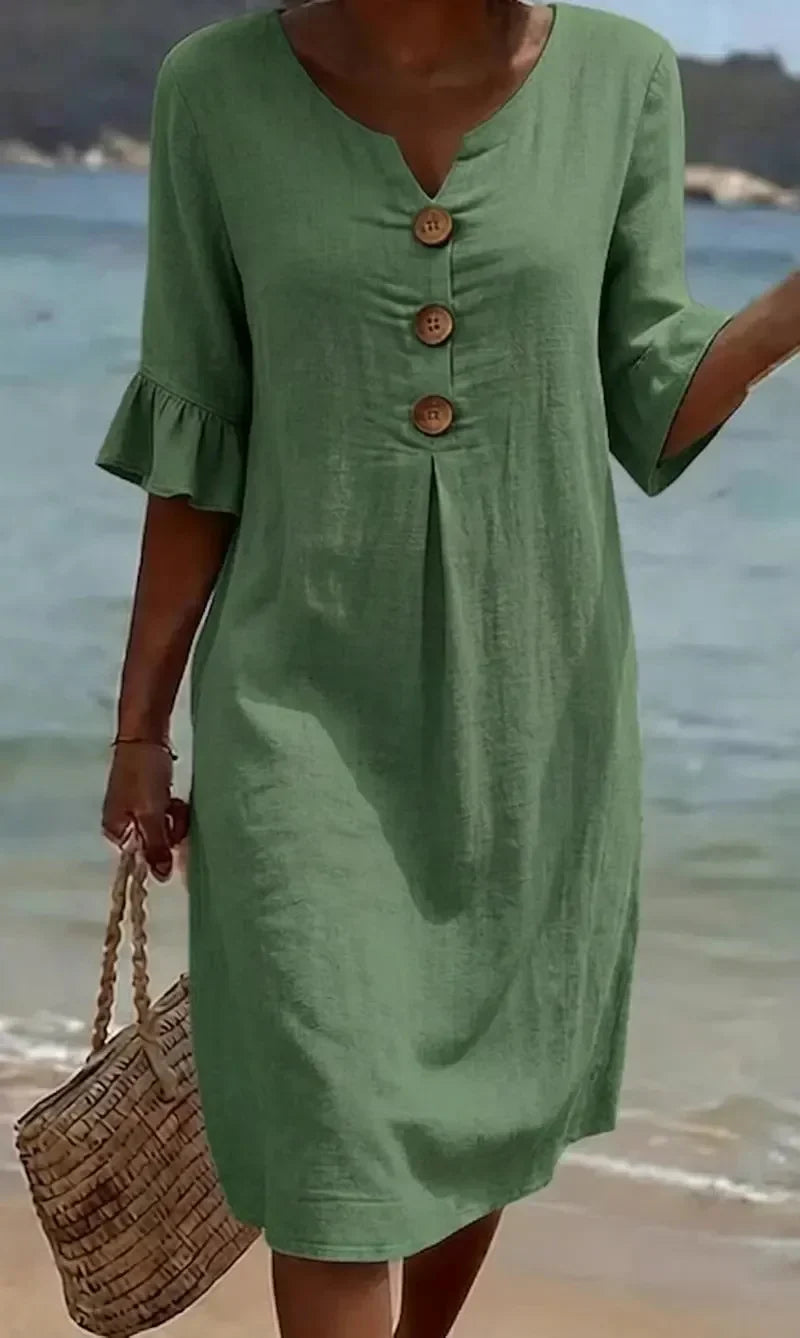 Stylish vacation midi dress for women, casual design with a button front and flirty ruffle sleeves.