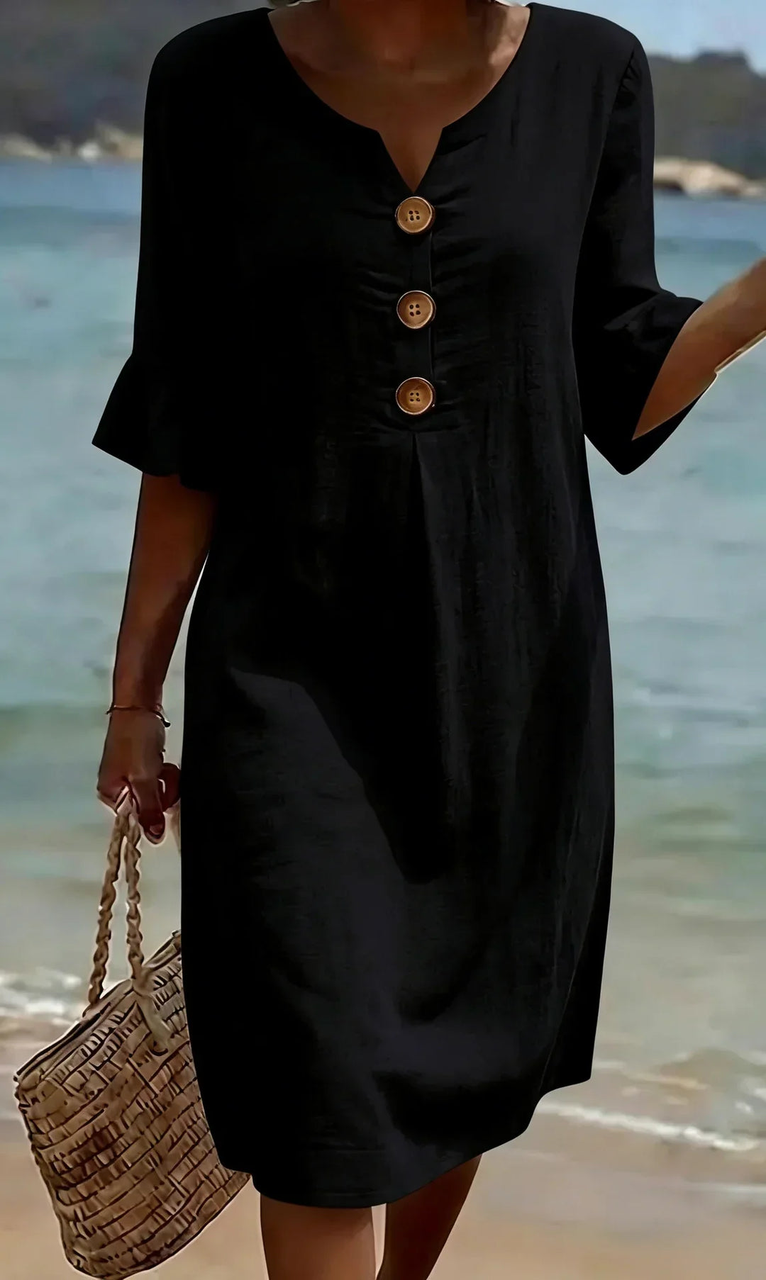 Trendy women's casual midi dress with elegant button-front and fashionable ruffle sleeve details.