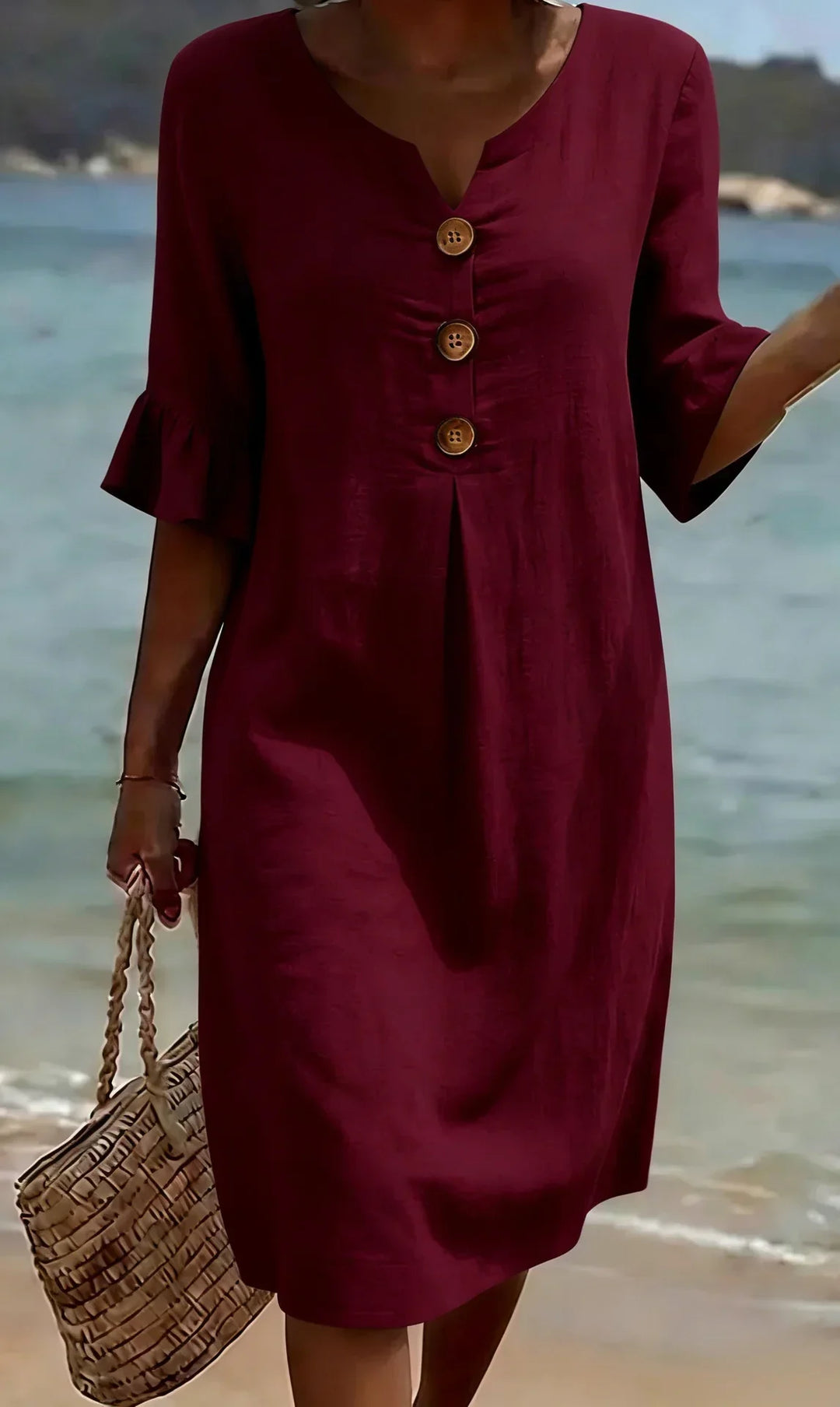 Simple yet chic women's midi dress, perfect for relaxed casual days, with button front & ruffles.
