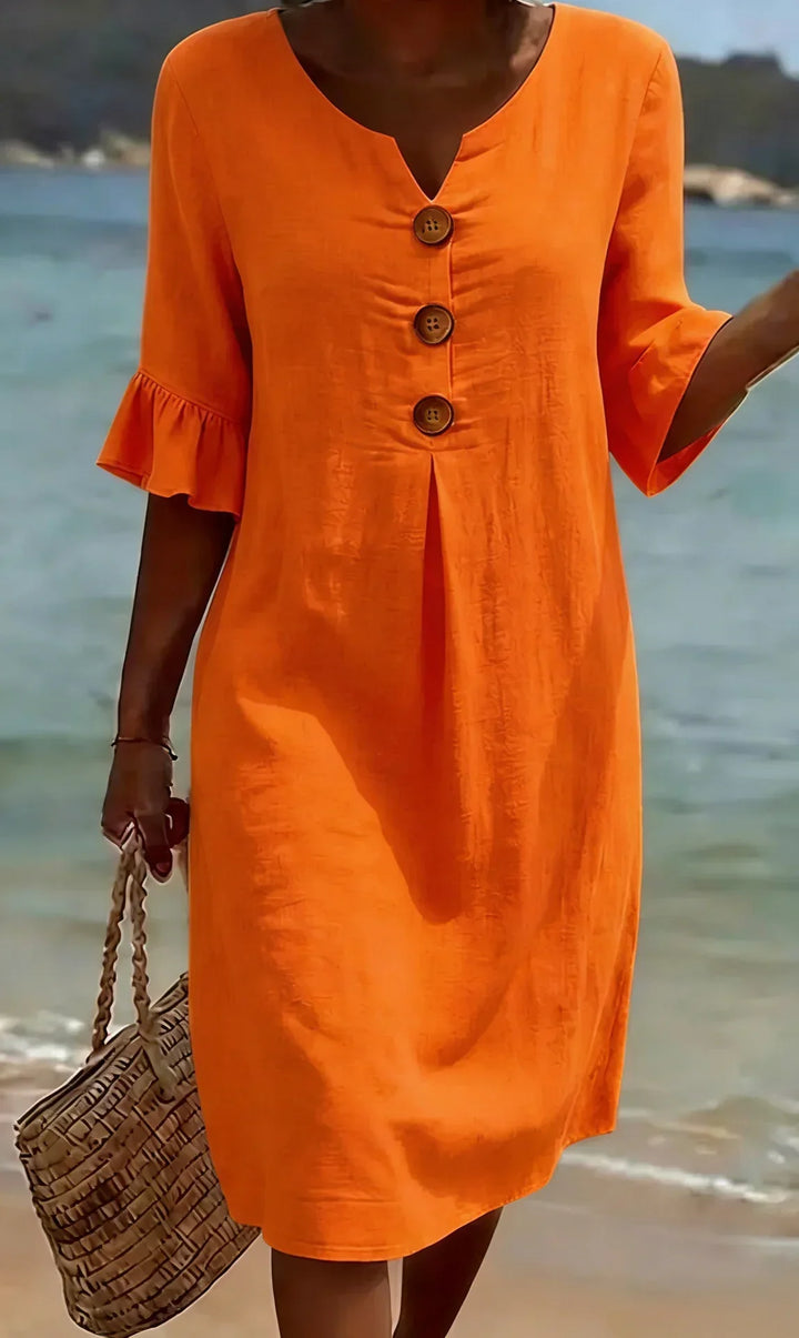 Women's button-front ruffle sleeve midi dress, offering comfortable, feminine fashion for daily wear.
